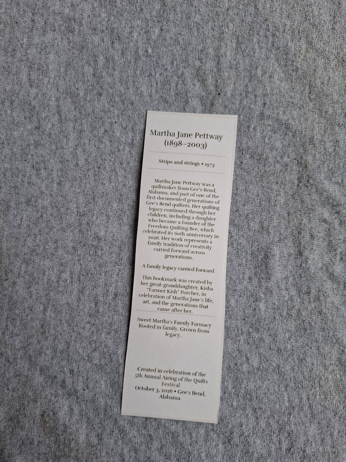 Back of Grandma Martha Jane Pettway's Strips and Strings (1973) heritage bookmark featuring her biography and family history.