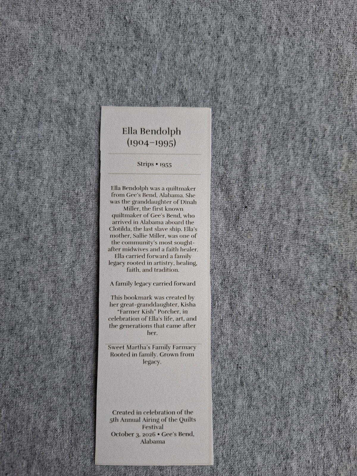 Back of Gran Ella Bendolph's Strips (1955) heritage bookmark featuring her biography and family history.