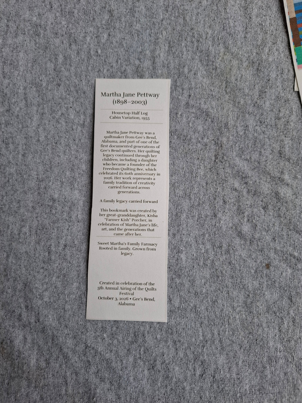 Back of Grandma Martha Jane Pettway's Housetop Half Log Cabin Variation (1955) heritage bookmark featuring her biography and quilting legacy.